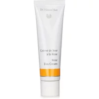 White tube of Dr Hauschka Rose Day Cream with gold accents, 30ml, featuring a minimalist design and text in black.