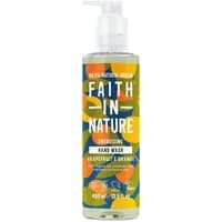 Clear bottle of Faith in Nature Grapefruit & Orange Hand Wash, 400ml, with colorful citrus design and pump dispenser.