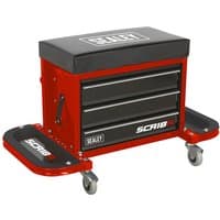 Red Sealey mechanic's utility seat with black cushioned top, three drawers, and side trays on caster wheels.