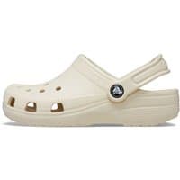 Cream Crocs toddler clog with ventilation holes, heel strap, and textured sole, size Infant 9.