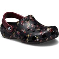 Black Crocs Kids Classic Graphic Clog with floral print, ventilation holes, and maroon adjustable heel strap.