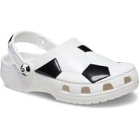 White Crocs toddler clog with black soccer ball pattern and adjustable heel strap, size Infant 10.