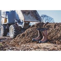 Brown Amblers Safety antistatic rigger boots, pull-on style, black reinforced toe, rugged sole, size 12, outdoor setting.