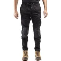 Black Caterpillar Dynamic Trouser with drawstring waist, reinforced knees, and multiple pockets, worn with tan boots.