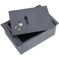 Gray Sealey floor safe with key lock, rectangular shape, removable lid, and two silver keys on top.