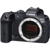 Black Canon EOS R7 APS-C mirrorless camera body with prominent grip and visible sensor, no lens attached.