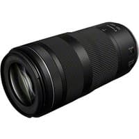 Black Canon RF 100-400mm telephoto lens with textured zoom ring and image stabilization features.