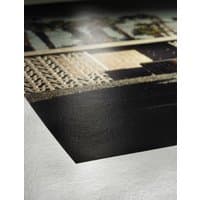 Hahnemühle Photo Rag Metallic White Smooth paper with glossy finish and detailed texture, showcasing vivid print quality.