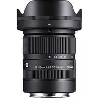 Black Sigma 18-50mm F2.8 DC DN lens for Sony E-Mount with ribbed zoom ring and lens hood.
