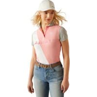 Flamingo pink Ariat women's polo with gray sleeves, white diagonal stripe, and embroidered logo.