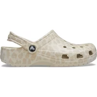 Beige Crocs Classic Animal Clog with giraffe pattern, ventilation holes, and adjustable heel strap.