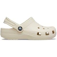 Beige Crocs Girl's Classic Clog with ventilation holes, heel strap, and textured sole, Size 1.