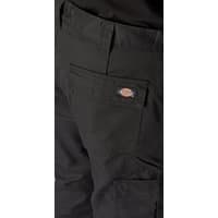 Black Dickies trousers, size 30, with back pocket and logo patch, durable fabric.