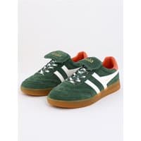 Gola women's evergreen trainers with off-white stripes, gum sole, and orange inner lining, size 7.