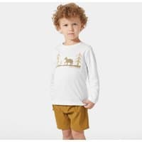 White Helly Hansen kids' long sleeve top with gold graphic of trees and moose, worn by child with brown shorts.