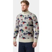 White Helly Hansen wool knit sweater with colorful Nordic patterns, ½ zip, and ribbed cuffs, collar, and hem.