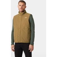 Brown Helly Hansen men's insulated vest, high collar, snap buttons, and logo on chest, worn by a model.