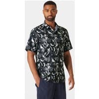 Navy Helly Hansen short-sleeve shirt with white abstract pattern, button-up front, and collar, size 2XL.
