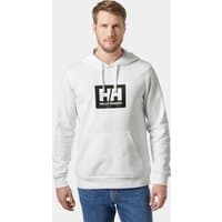 White Helly Hansen hoodie with black HH logo on chest, drawstring hood, and ribbed cuffs, worn by a male model.