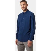 Blue Helly Hansen men's long sleeve shirt with button-up front and collar, worn by a model.
