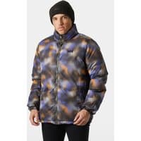 Reversible green puffer jacket with abstract pattern, high collar, and Helly Hansen logo on chest.