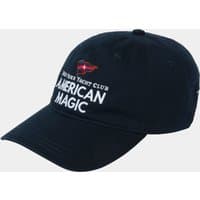 Navy Helly Hansen cotton cap with embroidered "American Magic" logo and red yacht graphic on the front.