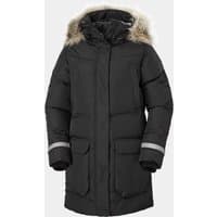 Black Helly Hansen women's waterproof down parka with faux fur hood trim, large pockets, and reflective sleeve accents.