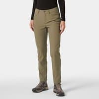 Green Helly Hansen women's trousers, five-pocket design, straight fit, button closure, worn with hiking shoes.