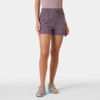 Purple women's shorts with elastic waistband, drawstring, and side pockets, worn by a model, size XL.