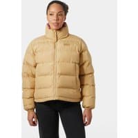 Brown Helly Hansen reversible puffer jacket, medium size, with high collar and quilted design worn by a woman.