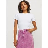 White Jjxx Gigi Baby Tee, short-sleeved, crew neck, fitted style, worn by model with pink skirt.