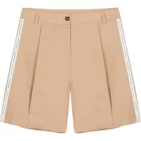 Beige linen Bermuda shorts with pleats, button closure, and side stripe detail by Colmar.