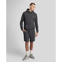 Gunmetal cotton sweat shorts with elastic waistband, drawstring, and Lyle & Scott logo on left leg.