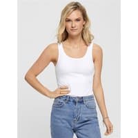 White XL tank top with scoop neckline and fitted design, worn by model with light blue jeans.