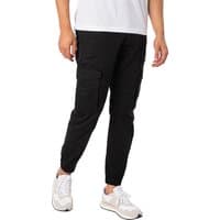 Black Paul Flake 542 Cargos by jack & jones, featuring side pockets and elastic cuffs, worn with white sneakers.