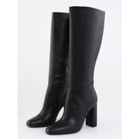 Black Steve Madden Ally knee-high boots with block heels and pointed toes.