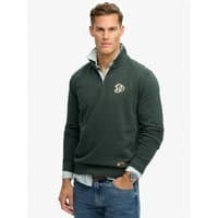 Eagle green Superdry&Co half zip sweatshirt with embroidered logo on chest, ribbed cuffs, and hem, worn by a model.