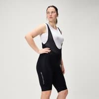 Women's black FS260 DropSeat™ Bib Shorts with mesh straps and white logo on the leg, designed for cycling comfort.