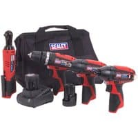 Sealey CP1200 Series kit with red and black cordless drill, ratchet, impact driver, charger, and black carry bag.