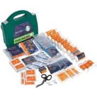 Green Sealey first aid kit with white cross, containing bandages, wipes, scissors, and dressings, BS 8599-1 compliant.