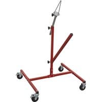 Red Sealey wheel painting stand with adjustable arms and four caster wheels for mobility.