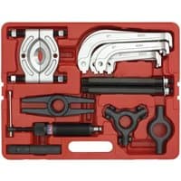 Red case with Sealey PS982 25-piece hydraulic puller set, featuring silver and black components, including puller arms.