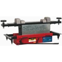 Red and black Sealey jacking beam with arm extenders, flat roller supports, and adjustable lifting pads.