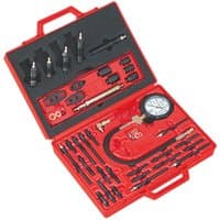 Red Sealey diesel engine compression test kit with gauge, hoses, and adapters in a molded carrying case.