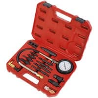 Red Sealey VSE204 diesel engine compression test kit with gauge, hoses, and adapters in a molded carrying case.
