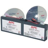 APC Battery Replacement Cartridge RBC18, black rectangular unit with labels, includes two software CDs.