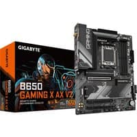 GIGABYTE B650 GAMING X AX V2 motherboard with black PCB, silver heatsinks, and PCIe slots, next to its colorful box.
