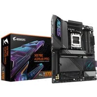 GIGABYTE X870E AORUS PRO motherboard with black heatsinks, RGB lighting, and multiple PCIe slots, next to its box.