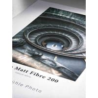 Hahnemühle 10641901 photo paper with spiral staircase image, textured matte finish, white border.