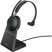 Black Jabra Evolve2 65 USB-A UC Mono headset on charging stand with cushioned ear pad and adjustable headband.